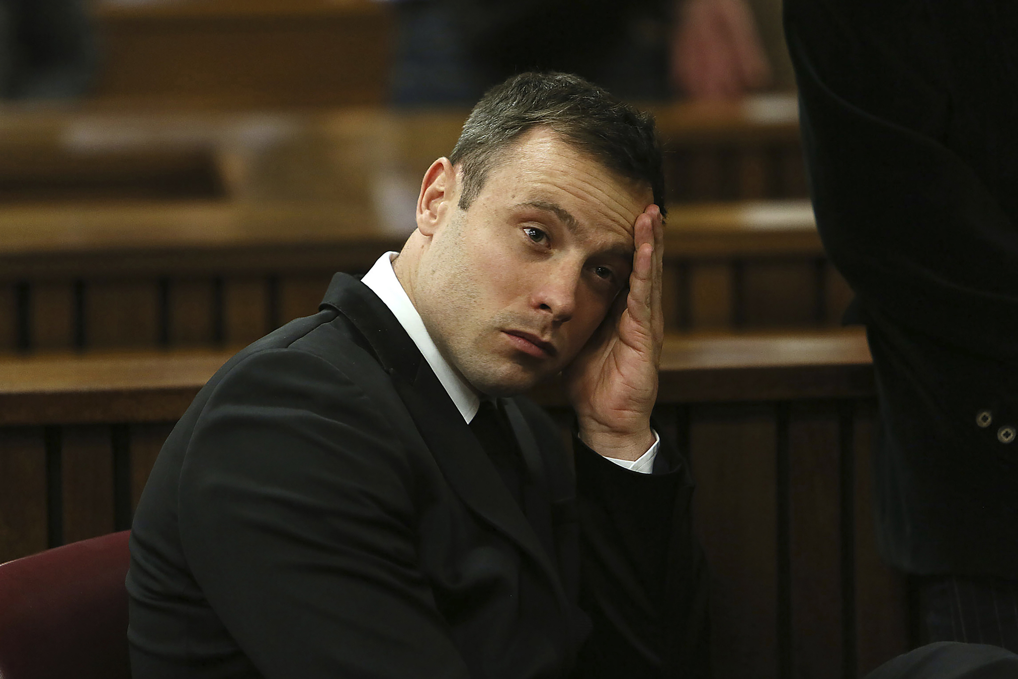 Oscar Pistorius gestures, at the end of the fourth day of sentencing proceedings in the high court in Pretoria.